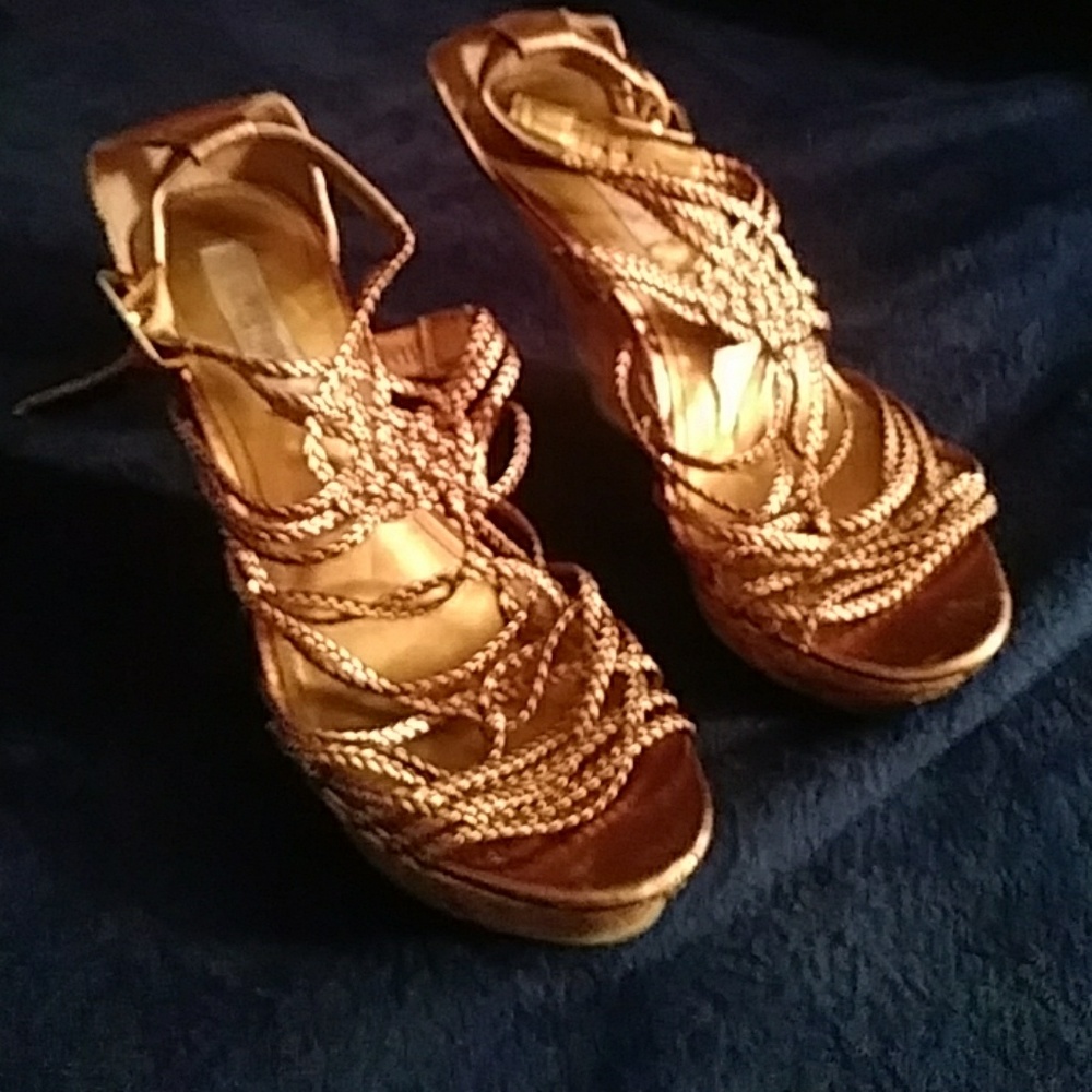 Jennifer Lopez gold wedge sandals